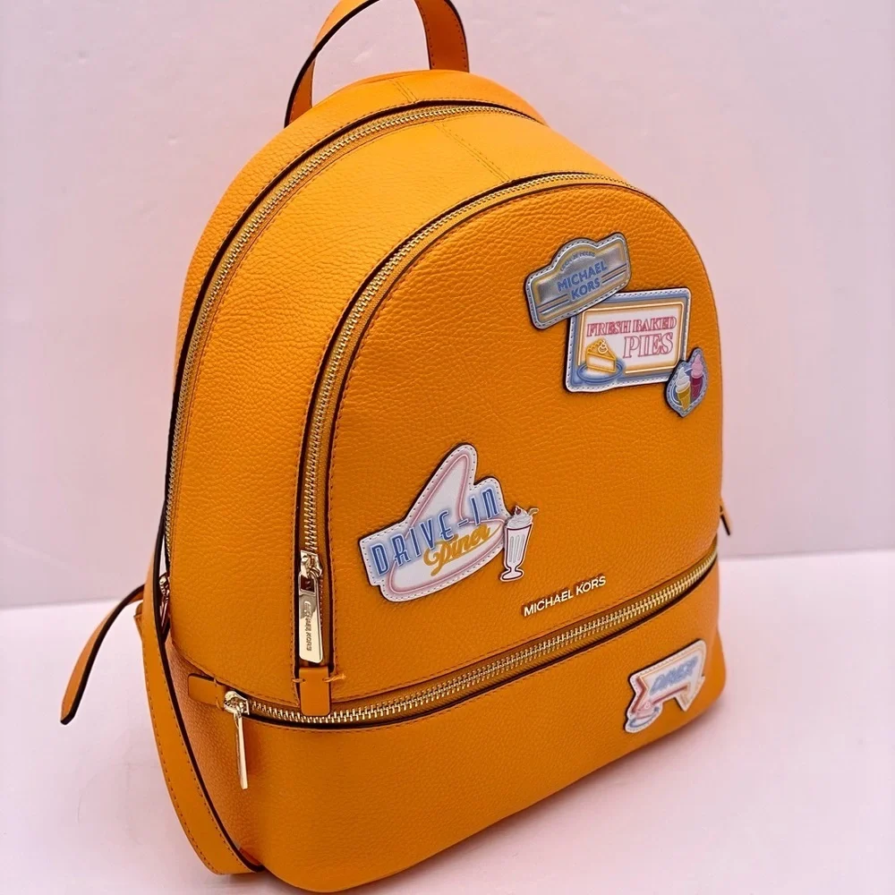 Michael Kors Vibrant Orange Backpack with Fun Patches